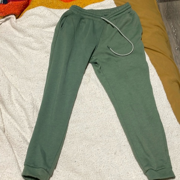 These are girls sweat pants made by Cl SONO, in an XS. They are pale Clover. - Picture 1 of 4